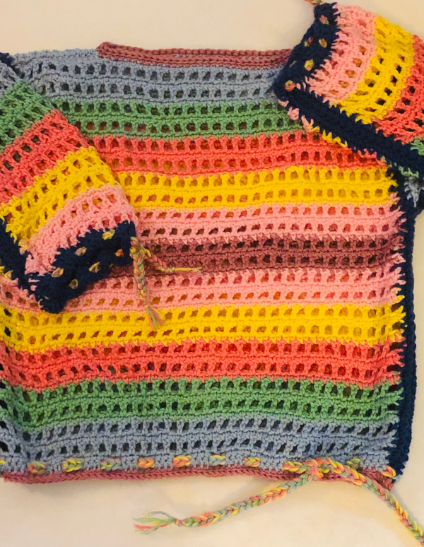 Badee Couture design called Breezy, If you think of Crocheted garments being something worn only in the Fall and Winter, this sweater proves that theory wrong. Color; Sherbe